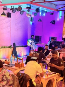 Guests dining at one of the cafes in Tapovan, Rishikesh