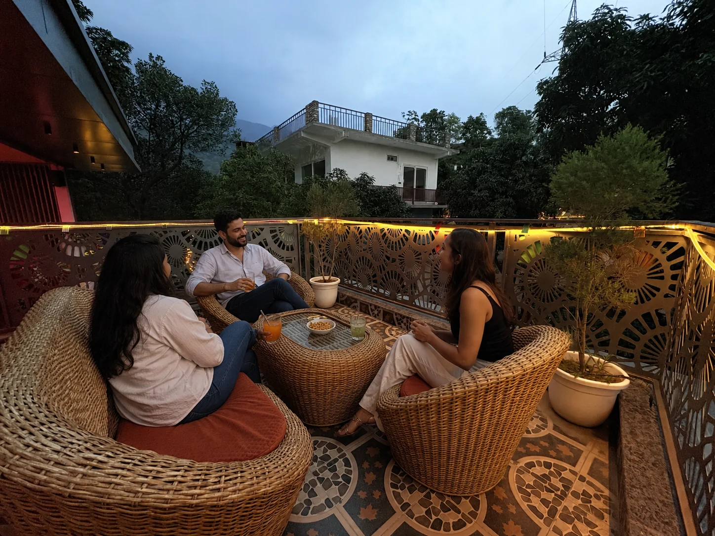 Guests seated on the Pink Cafe rooftop